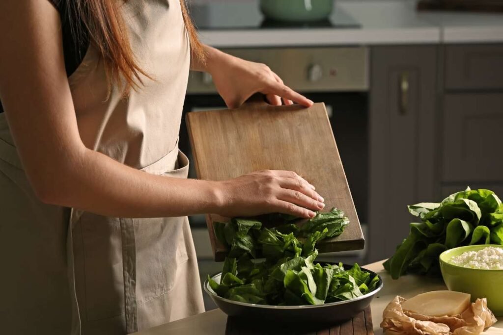 Woman preparing calming herbal blend in modern kitchen for stress relief during busy workday